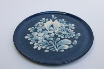 catalog photo of artist signed hand painted pottery plate, old world style folk art floral white on deep blue 