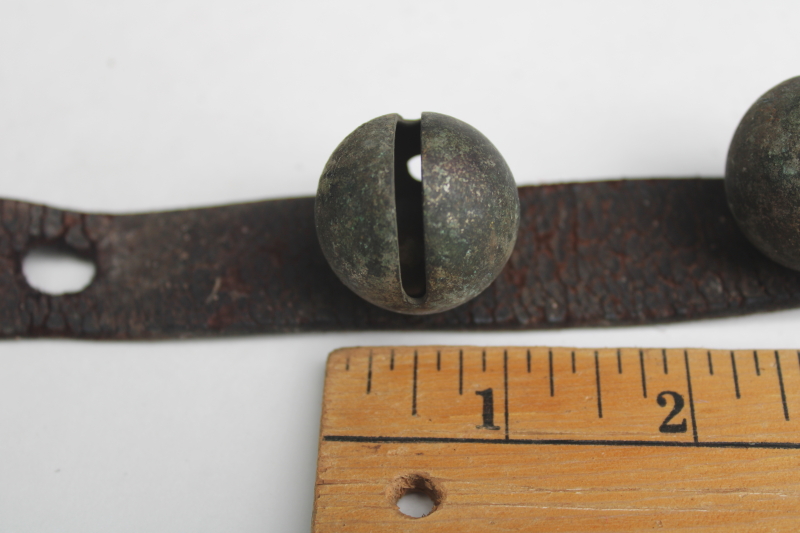 photo of authentic antique sleigh bells, silver tone brass bells on worn old leather strap horse harness #7