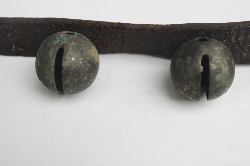 photo of authentic antique sleigh bells, silver tone brass bells on worn old leather strap horse harness #8