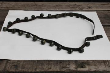 authentic antique sleigh bells, silver tone brass bells on worn old leather strap horse harness 