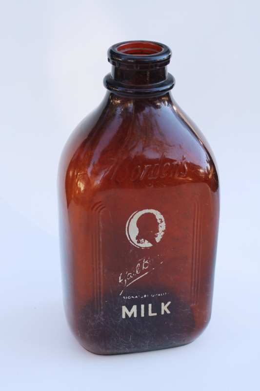 photo of authentic old Borden milk bottle, vintage amber brown glass w/ Gail Borden silhouette #1