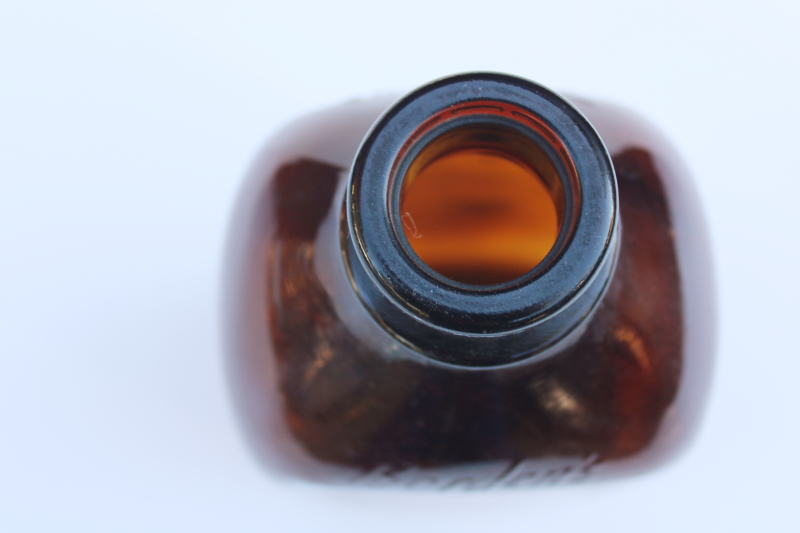 photo of authentic old Borden milk bottle, vintage amber brown glass w/ Gail Borden silhouette #2