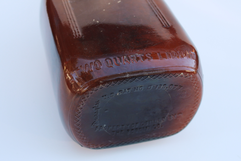 photo of authentic old Borden milk bottle, vintage amber brown glass w/ Gail Borden silhouette #5