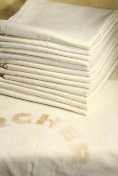 catalog photo of authentic vintage unbleached cotton feedsack fabric, lot of a dozen old grain sacks