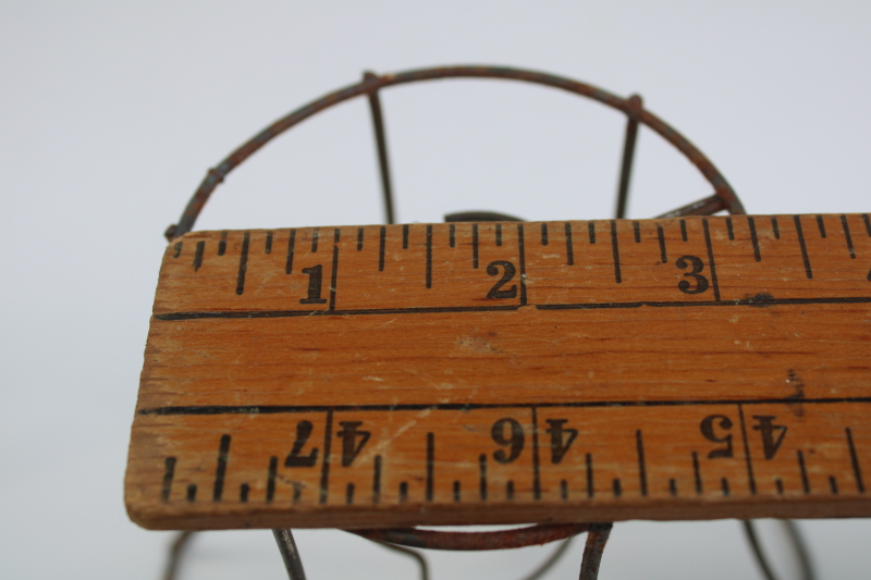 photo of bare wire lamp shade frames, trio of little bell shaped shades clip on bulb type chandelier light shades  #11