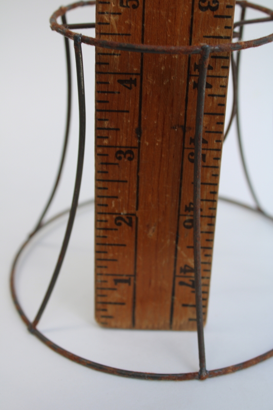 photo of bare wire lamp shade frames, trio of little bell shaped shades clip on bulb type chandelier light shades  #12