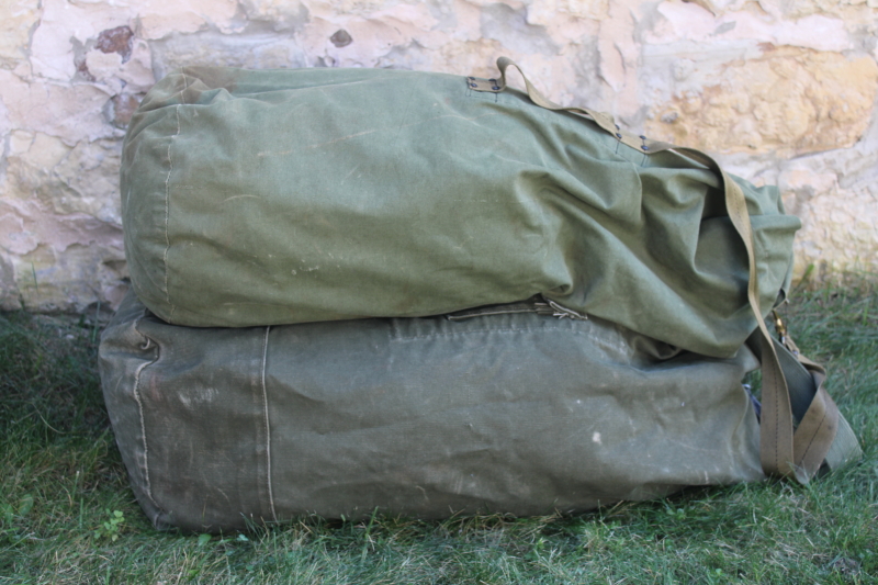 photo of beat to hell vintage cotton US Army issue duffle bags or military surplus duffels  #1