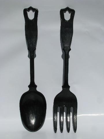 photo of big cast metal fork and spoon, primitive figural sign art #1