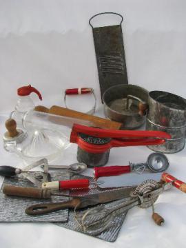 catalog photo of big lot of vintage kitchen utensils & kitchenware, some w/ red handles