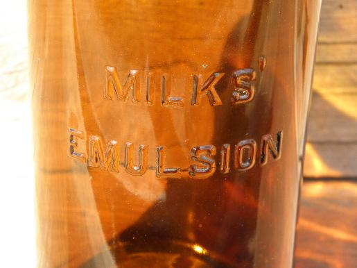 photo of big old amber glass patent medicine bottle, Milks Emulsion display jar #2