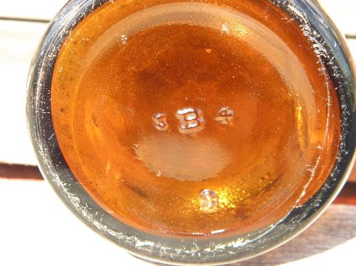 photo of big old amber glass patent medicine bottle, Milks Emulsion display jar #3