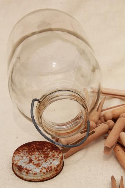 photo of big old bail handle glass pickle jar full of vintage wood clothespins #8