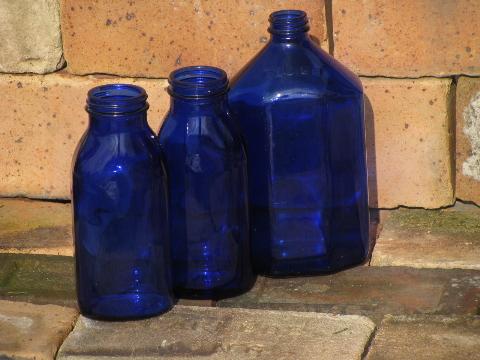 photo of big old cobalt blue glass medicine bottles, vintage bottle lot #1