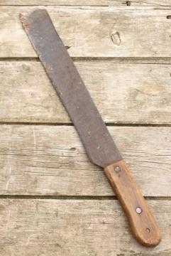 catalog photo of big old corn knife hay cutter machete, vintage forged steel blade primitive farm tool