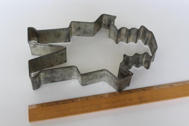 photo of big old metal cookie cutter for huge cookies, gingerbread or farmer man w/ #1