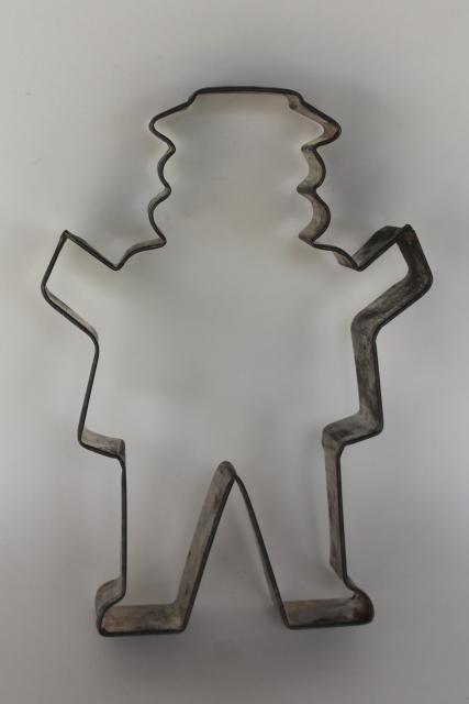 photo of big old metal cookie cutter for huge cookies, gingerbread or farmer man w/ #2