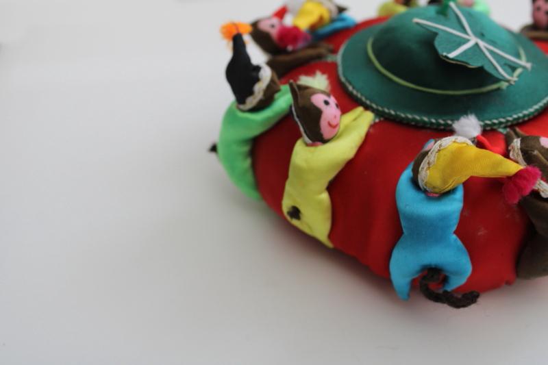 photo of big old round Chinese satin pincushion w/ ring of worry dolls tiny monkeys in hats #3