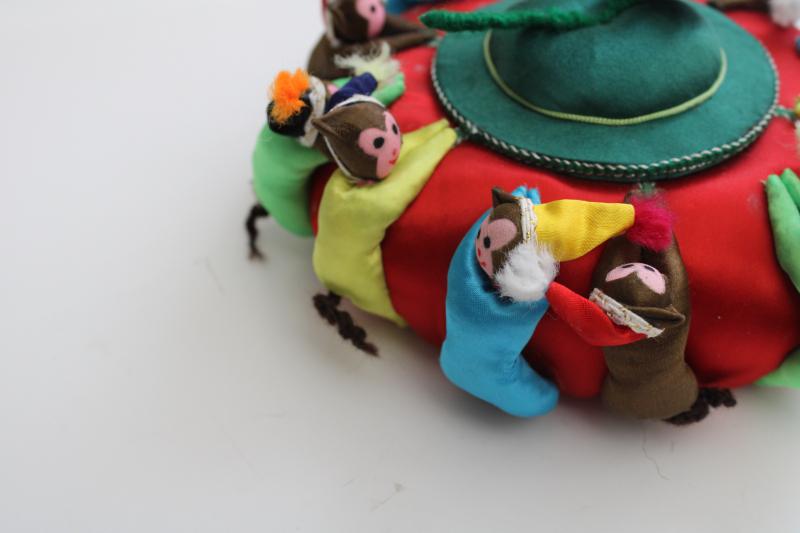 photo of big old round Chinese satin pincushion w/ ring of worry dolls tiny monkeys in hats #4