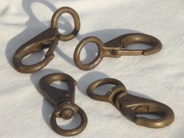 catalog photo of big old solid brass clips, lobster claw spring clasp hardware fittings
