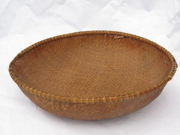 catalog photo of big round bottomed woven bowl, vintage camp souvenir Indian basket