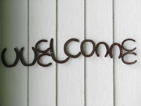 photo of big rustic western ranch Welcome sign, old wrought iron horseshoe letters #1