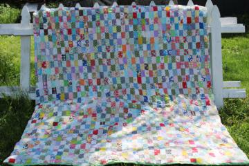 catalog photo of bohemian vintage handmade comforter, colorful prints patchwork blocks tied quilt