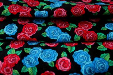 catalog photo of boho style print cotton fabric, bright colored roses on black background