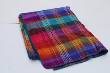 catalog photo of boho style vintage blanket or throw, deep rich rainbow colors woven plaid super soft acrylic 
