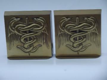 catalog photo of book ends pair heavy brass bookends w/ Caduceus, old PM Craftsman label