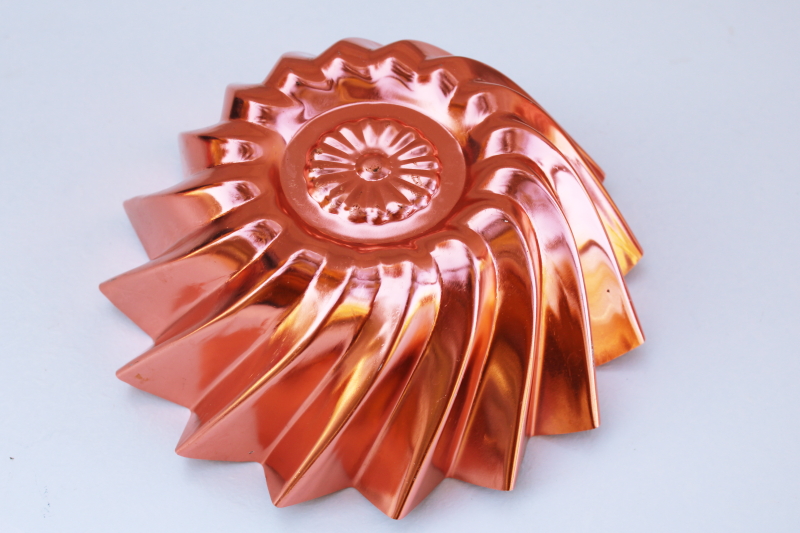 photo of bright copper color aluminum mold, whirling star jello mold mid-century vintage #1