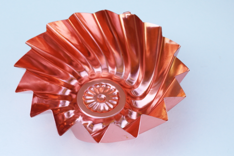 photo of bright copper color aluminum mold, whirling star jello mold mid-century vintage #2