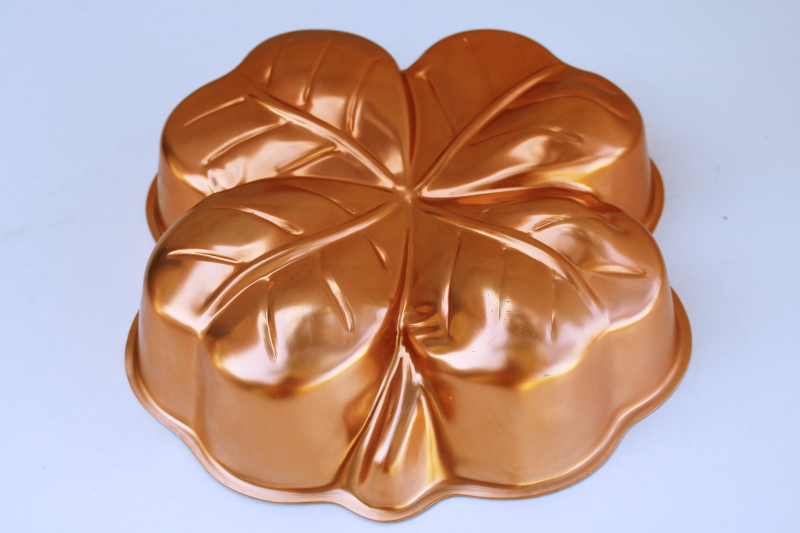 photo of bright copper color vintage aluminum mold, Irish four leaf clover shamrock jello mold #1