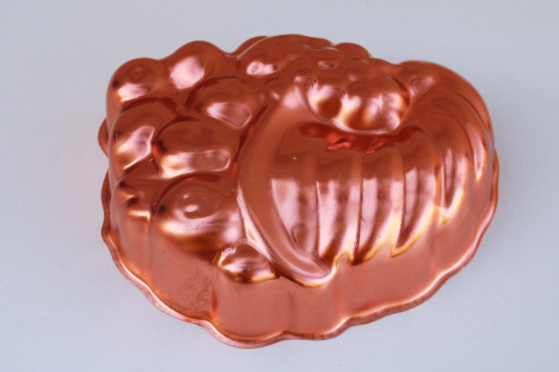 photo of bright copper color vintage aluminum mold, horn of plenty cornucopia jello mold #1