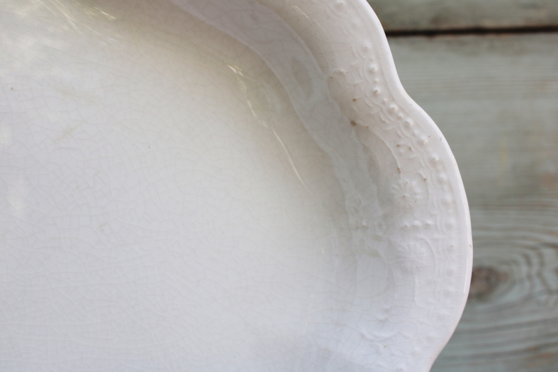 photo of browned old white ironstone china platter, scalloped edge tray w/ embossed border #2