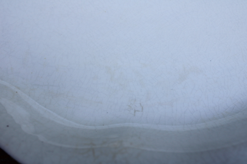 photo of browned old white ironstone china platter, scalloped edge tray w/ embossed border #4