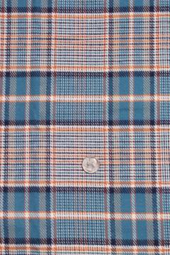 catalog photo of brushed heavy flannel fabric, winter weight warm work shirt material, cotton blend plaid