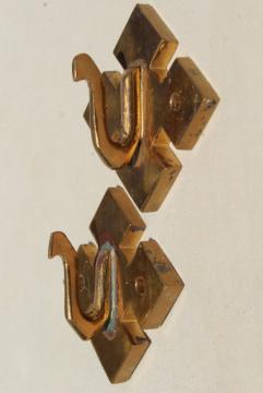 catalog photo of brutalist style bronze metal art wall hooks w/ angular shapes, mid-century mod vintage