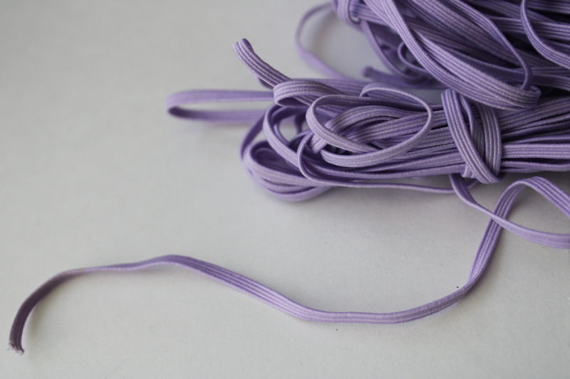 photo of bulk lot baby elastic 1/8 inch wide soft stretchy braid in many colors, shades of pink, blues, purple  #2