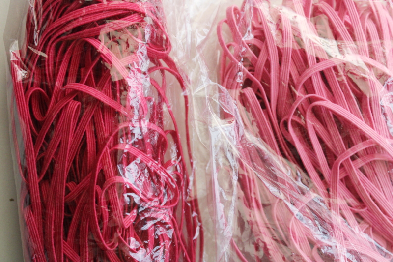 photo of bulk lot baby elastic 1/8 inch wide soft stretchy braid in many colors, shades of pink, blues, purple  #4