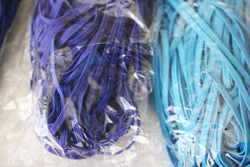 photo of bulk lot baby elastic 1/8 inch wide soft stretchy braid in many colors, shades of pink, blues, purple  #5