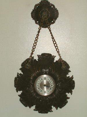 photo of burwood plastic wall clock w/ hanging medallion #1