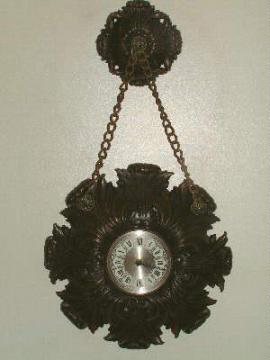 catalog photo of burwood plastic wall clock w/ hanging medallion