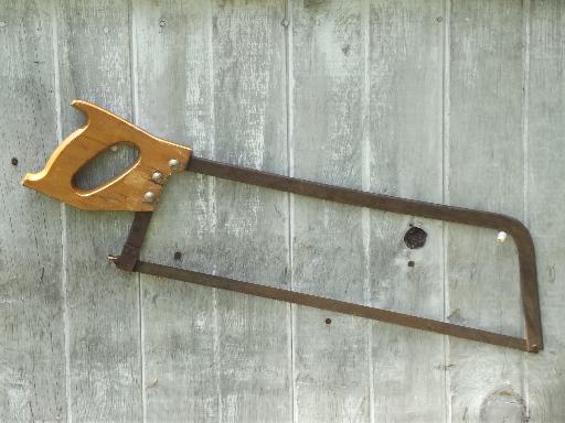 butcher's hand saw, old antique bone saw for butchering or hunting saw