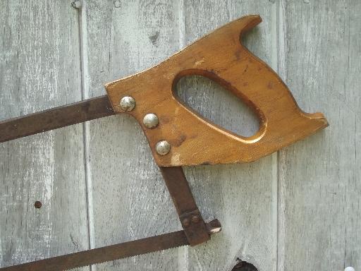 photo of butcher's hand saw, old antique bone saw for butchering or hunting saw  #2