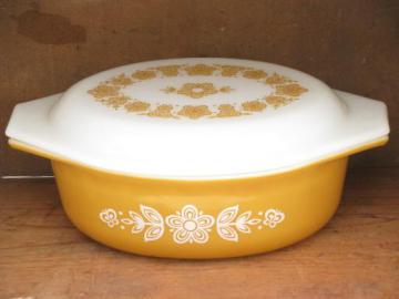 catalog photo of butterfly gold retro vintage harvest gold Pyrex glass casserole dish