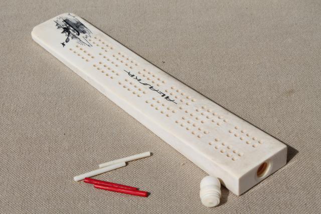 photo of carved bone cribbage board, signed scrimshaw style art souvenir of Alaska #2