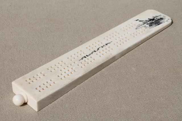 photo of carved bone cribbage board, signed scrimshaw style art souvenir of Alaska #4