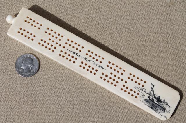 photo of carved bone cribbage board, signed scrimshaw style art souvenir of Alaska #5