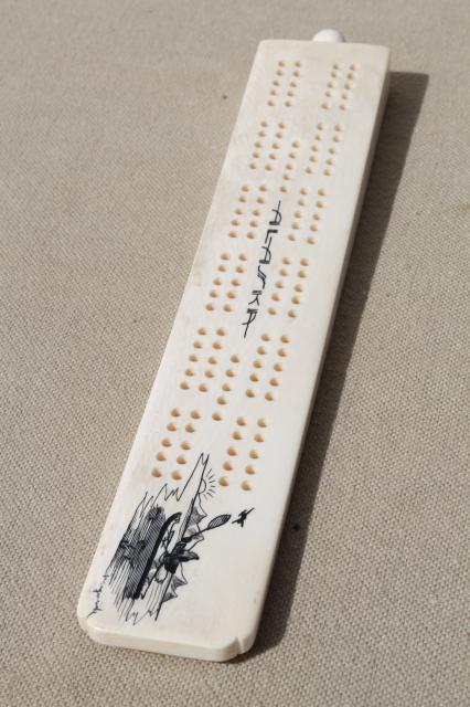 photo of carved bone cribbage board, signed scrimshaw style art souvenir of Alaska #7