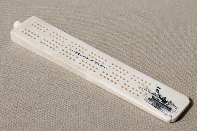 photo of carved bone cribbage board, signed scrimshaw style art souvenir of Alaska #9